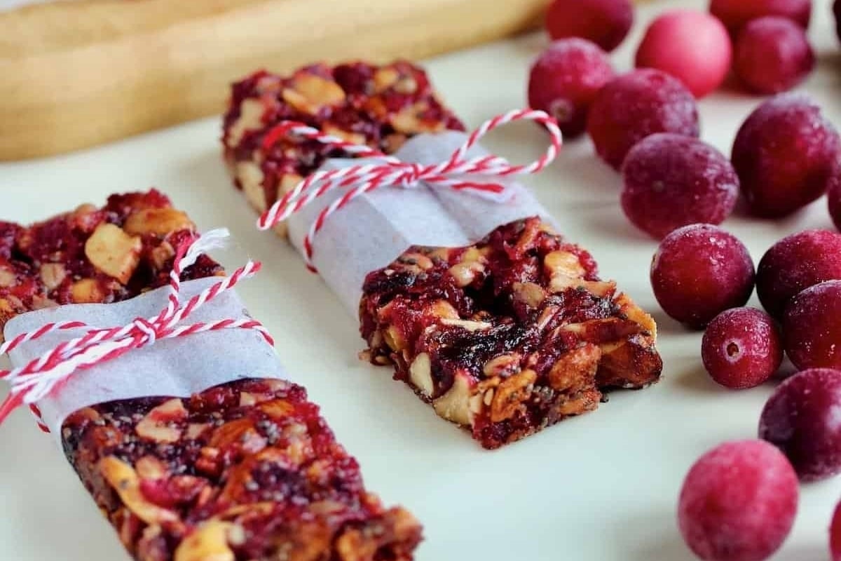 Cranberry granola bars packed with delicious nuts and dried cranberries are a must-try recipe for any cranberry snack lover.