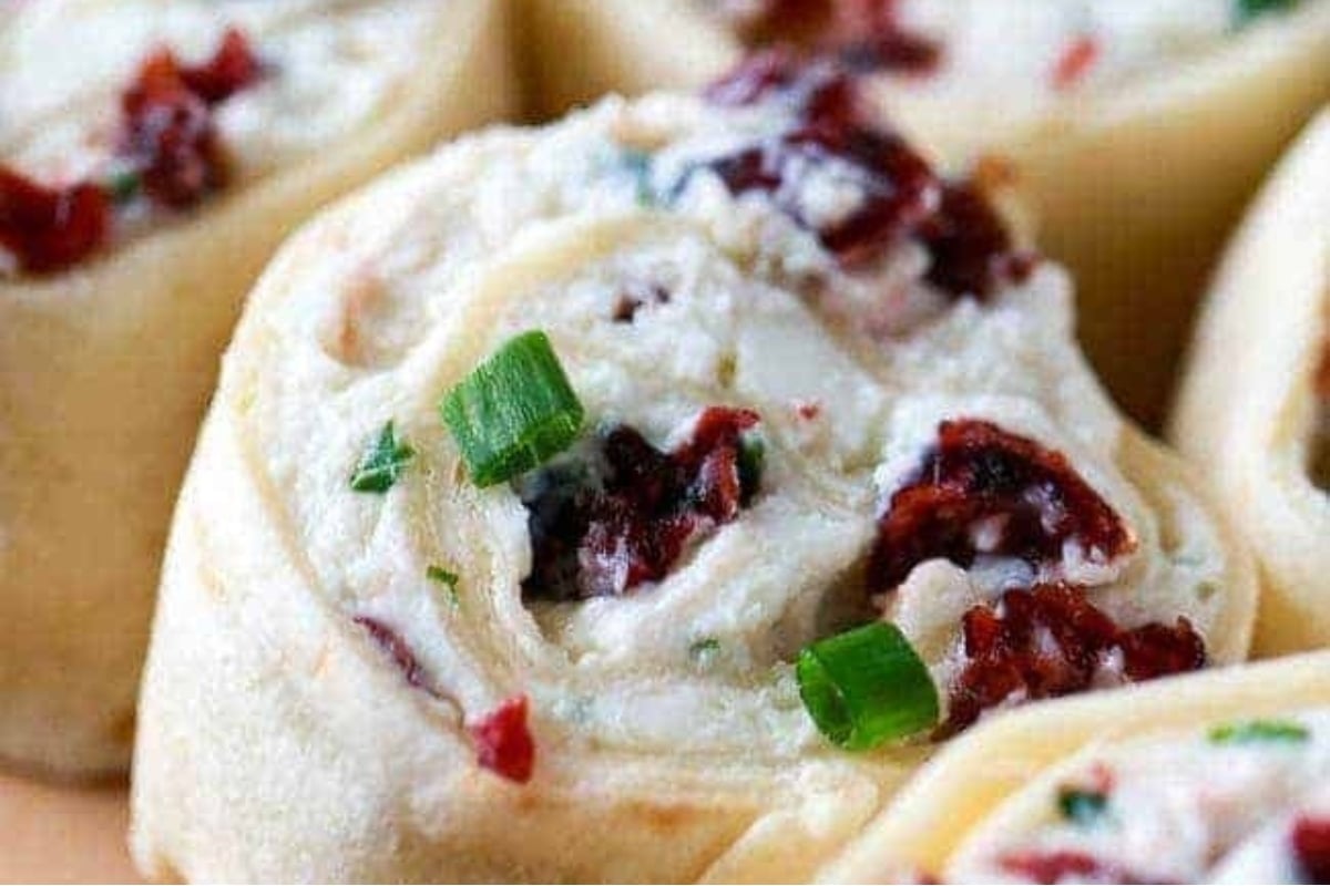 Chicken cranberry roll ups are a delicious cranberry snack recipe that combines the flavors of tender chicken, tangy cranberries, and fragrant chives.