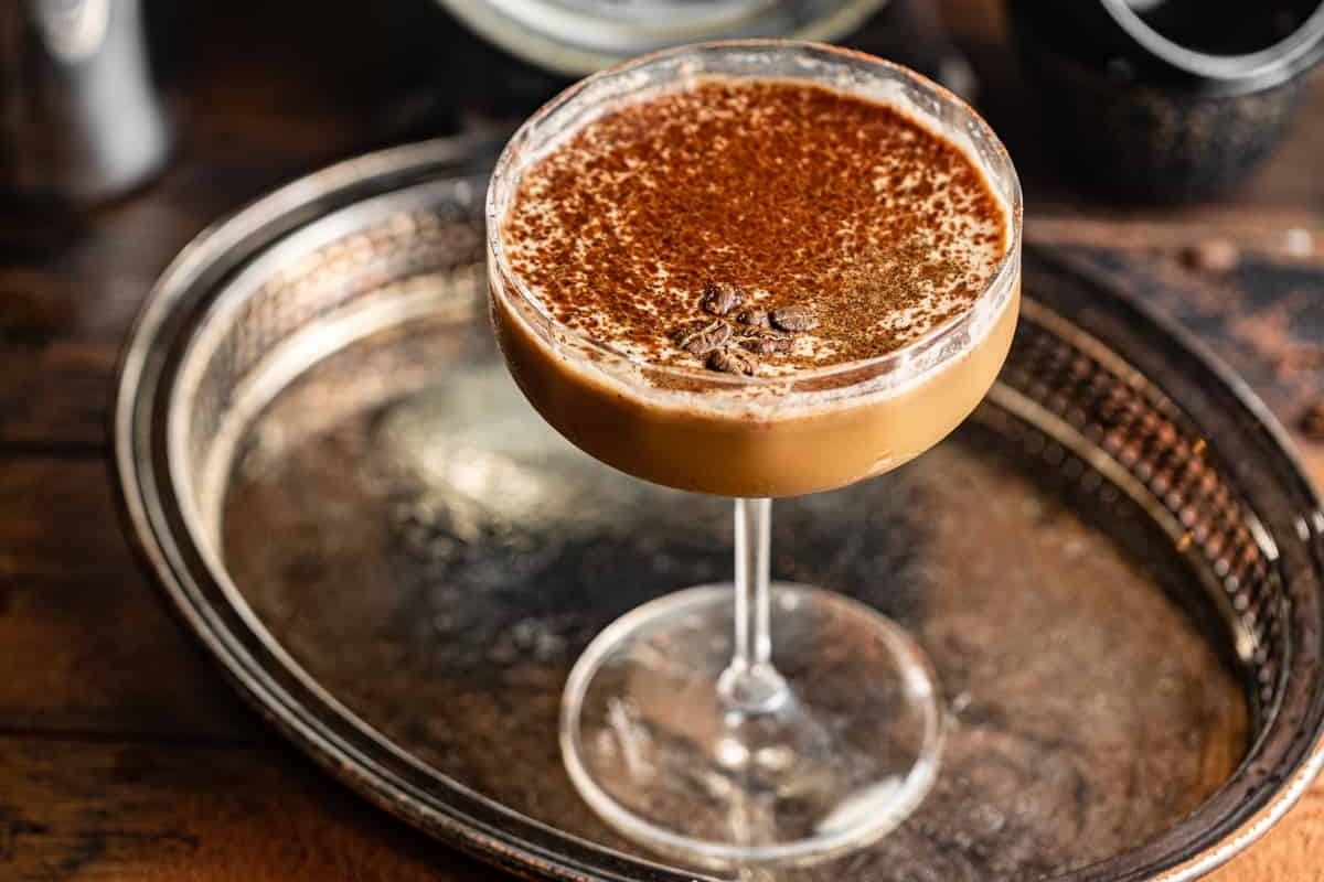 A festive martini in a glass on a tray, perfect for Christmas cocktails.