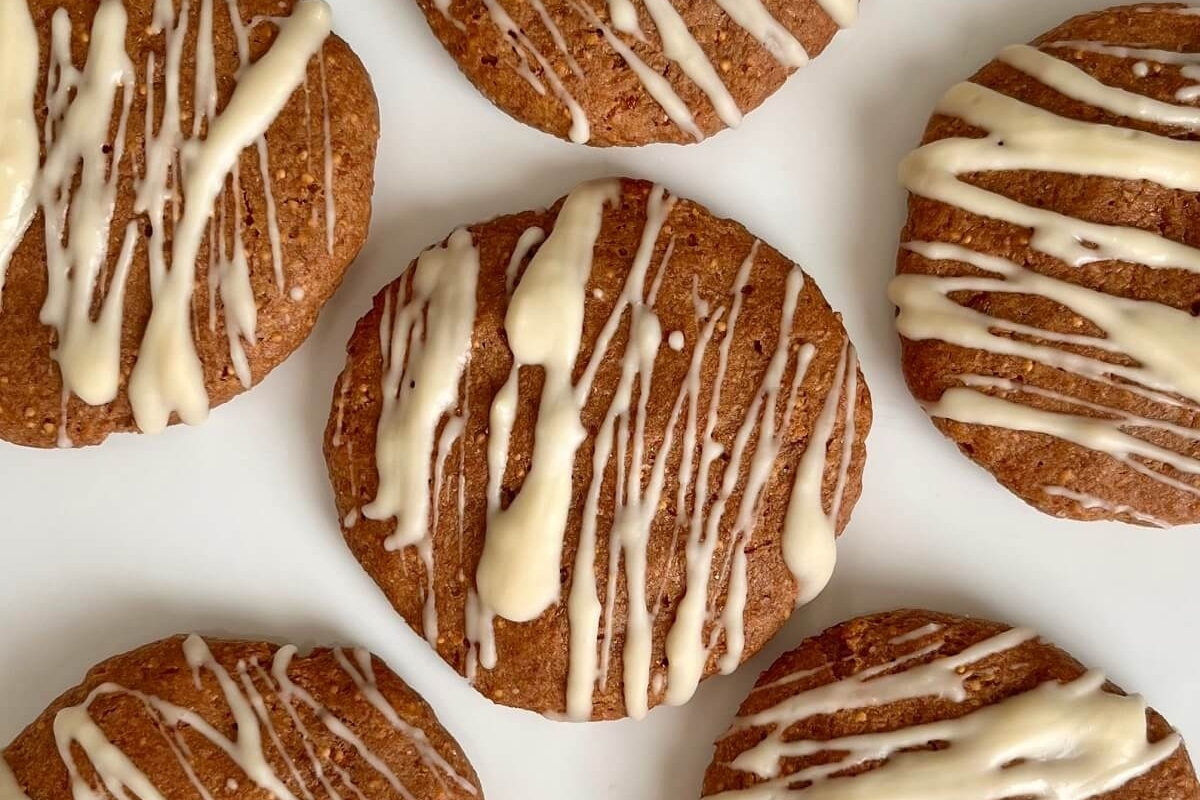 A group of frosty cookies topped with icing.