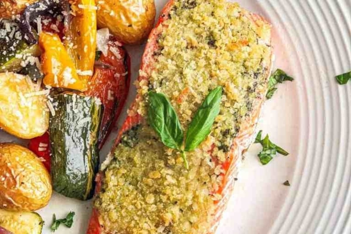 A plate with salmon and potatoes, evoking a mouthwatering feast of seven fishes.