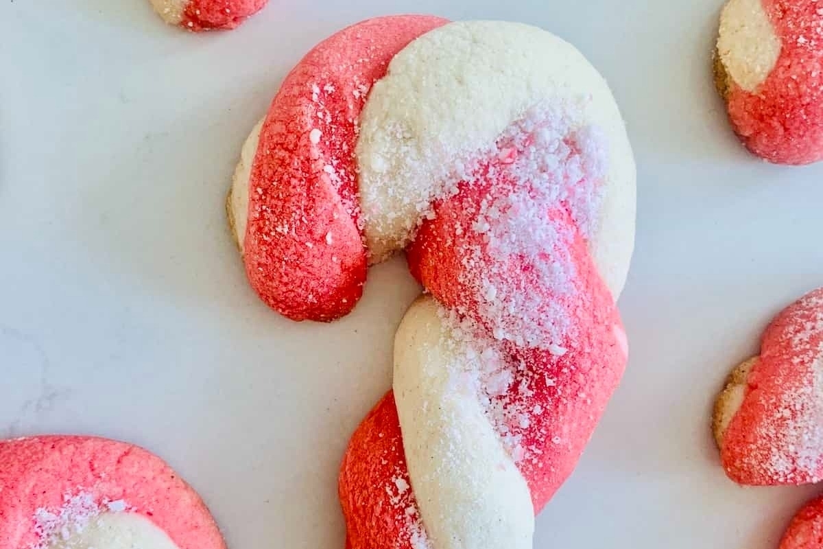 Peppermint candy cane cookies on a white surface.