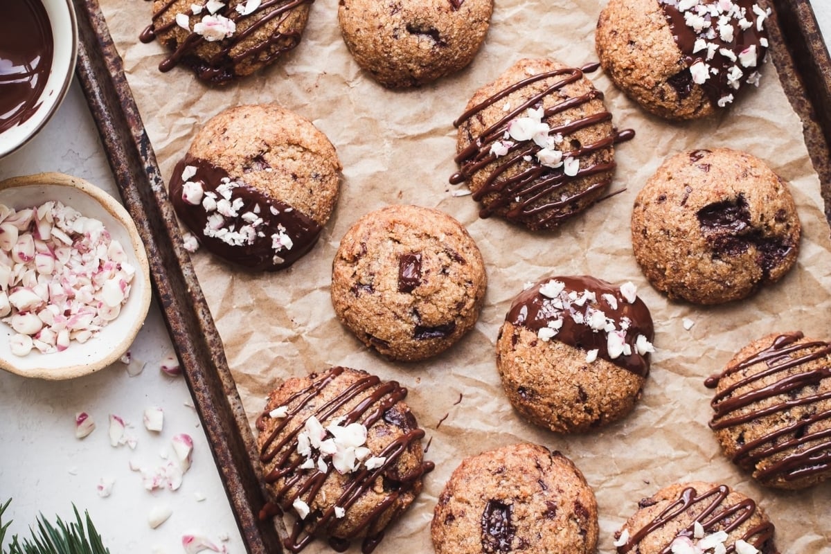 A tray of freezable cookies with chocolate and peppermint drizzle.