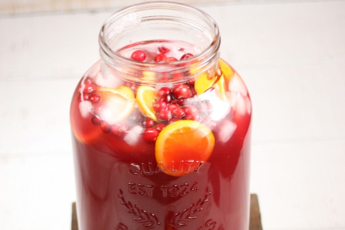 Refreshing cranberry sangria served in a charming mason jar.