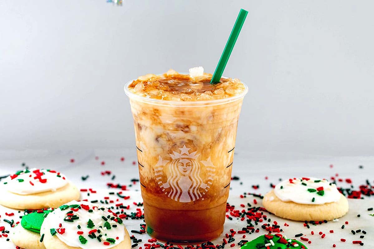 A Starbucks holiday iced coffee with cookies and sprinkles.