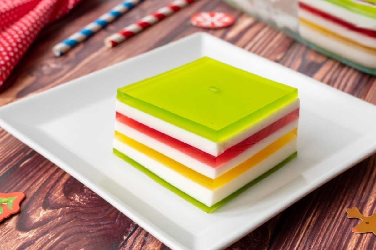 A plate of colorful jelly cake, perfect for make ahead holiday dishes.