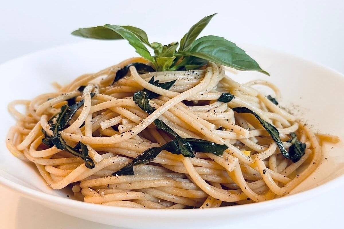 Looking for new year's eve meal ideas? Try a delicious bowl of spaghetti with sage leaves in it.