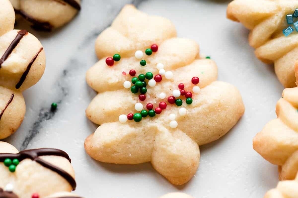 Christmas cookies decorated with sprinkles and made from freezable cookie recipes.