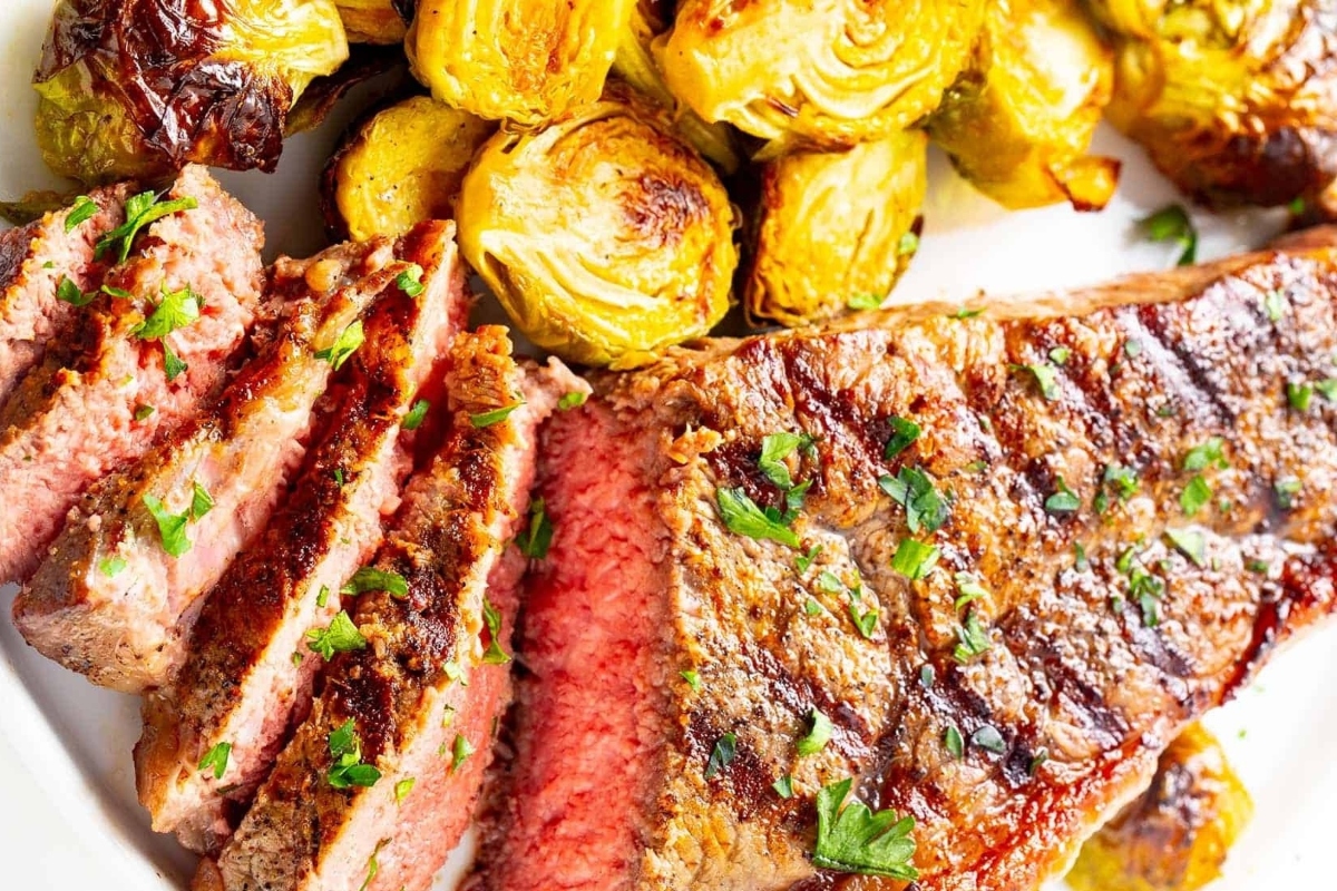 New Year's Eve meal idea: Steak and brussels sprouts on a plate.