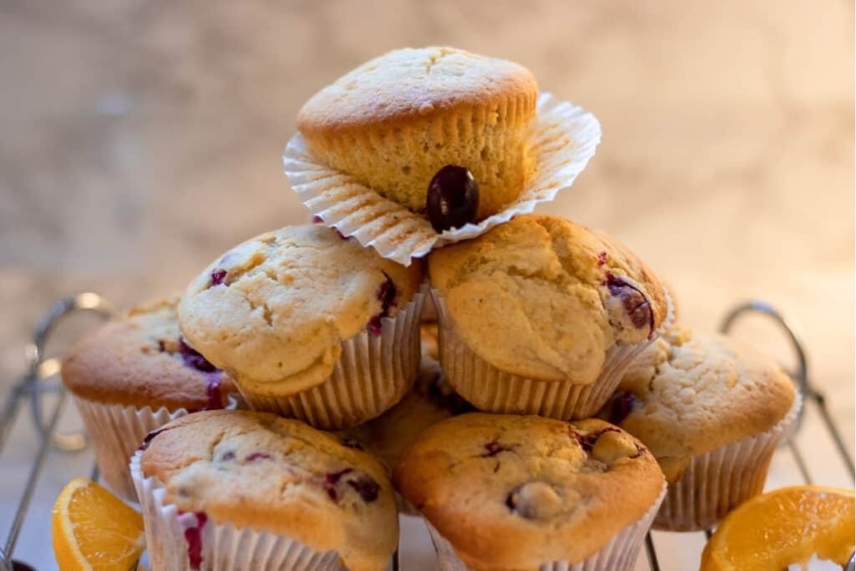 Cranberry orange muffins on a cooling rack - perfect cranberry snack recipe!