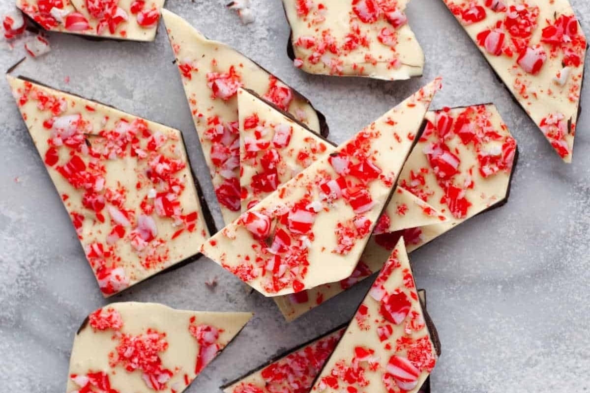 Peppermint bark with red and white sprinkles is a delightful treat featuring the refreshing taste of peppermint. Perfect for those who love peppermint recipes, this festive snack does not involve any baking or