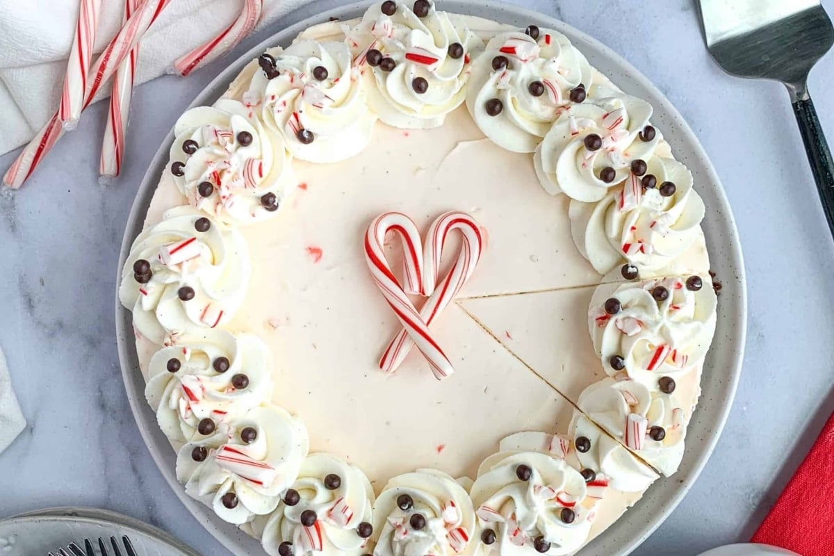 This plate features a delightful peppermint cheesecake adorned with candy canes.