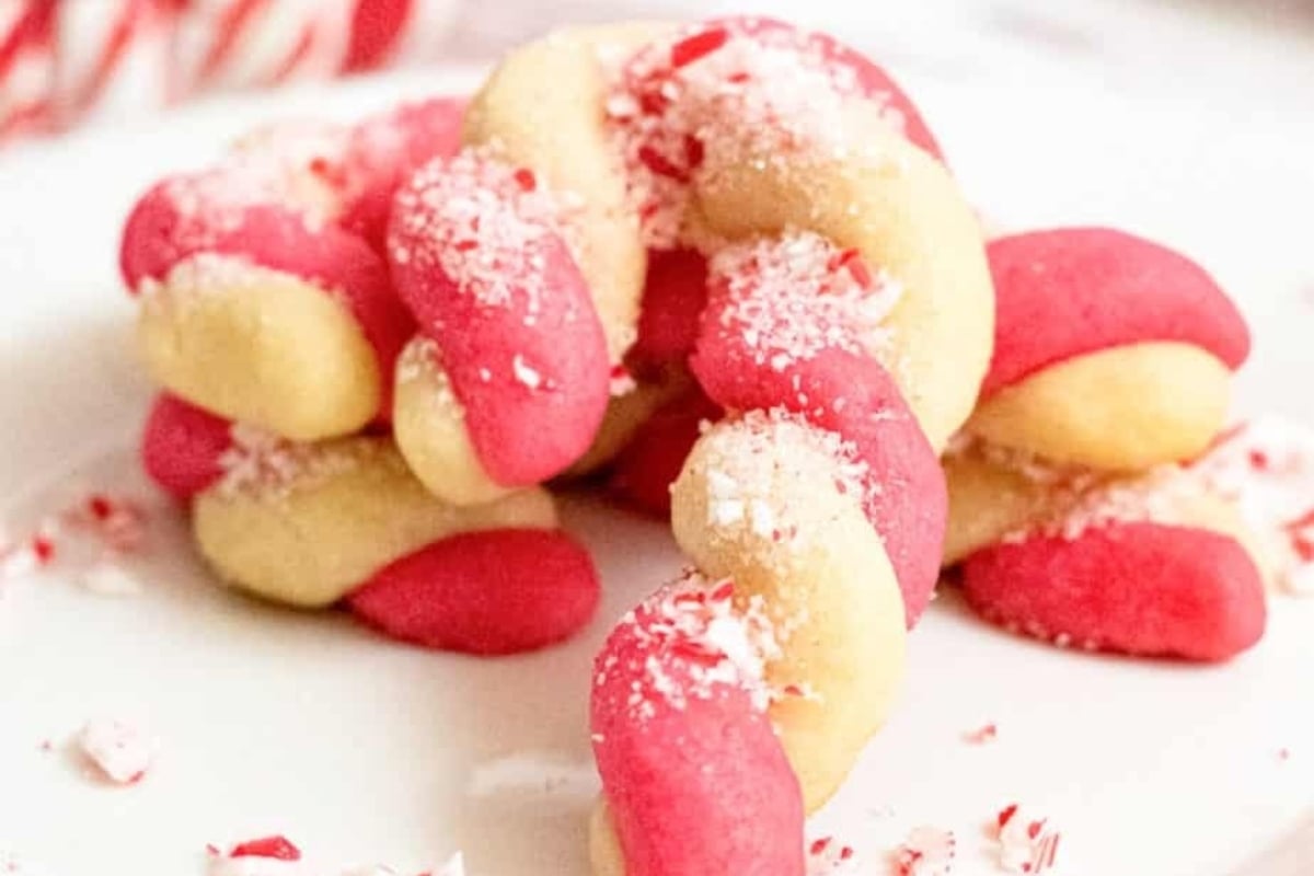 Candy cane cookies on a white plate, perfect for your candy cane recipes.