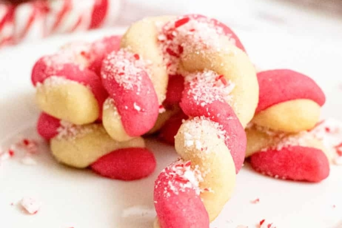 Peppermint candy cane cookies on a white plate.