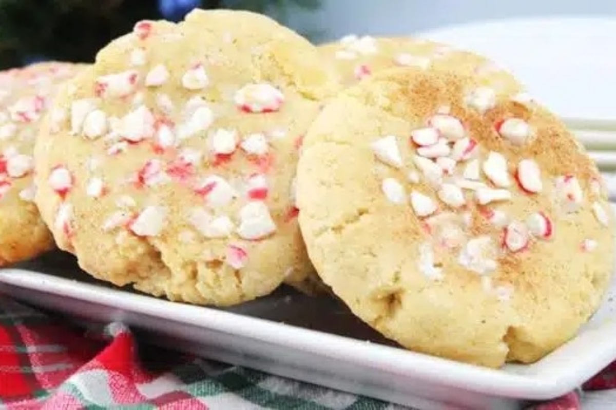 Peppermint cookies on a plate with sprinkles.