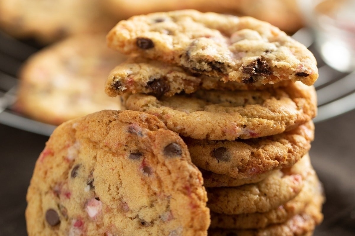 A stack of peppermint cookies on a plate.