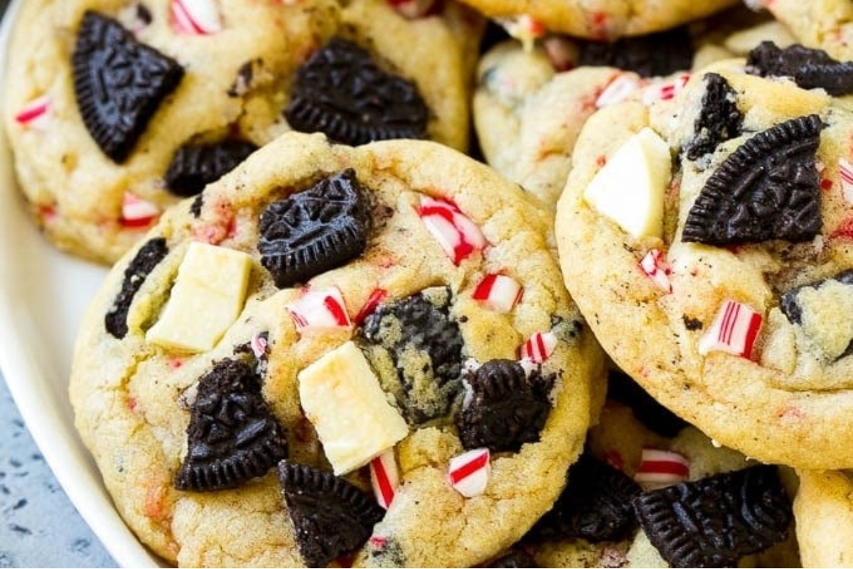 Oreo cookies with peppermint candies on a plate.