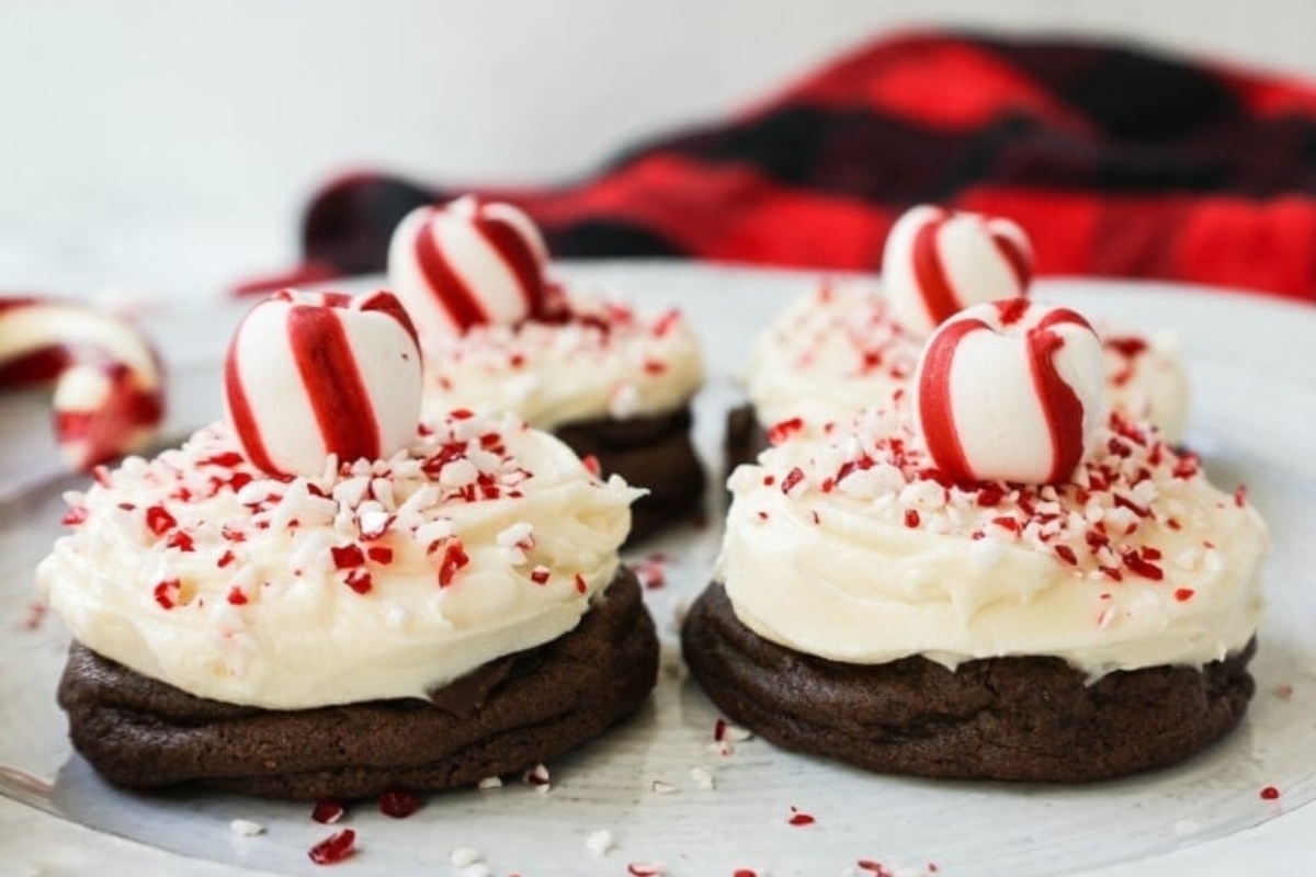 Peppermint cookies on a plate with candy canes.