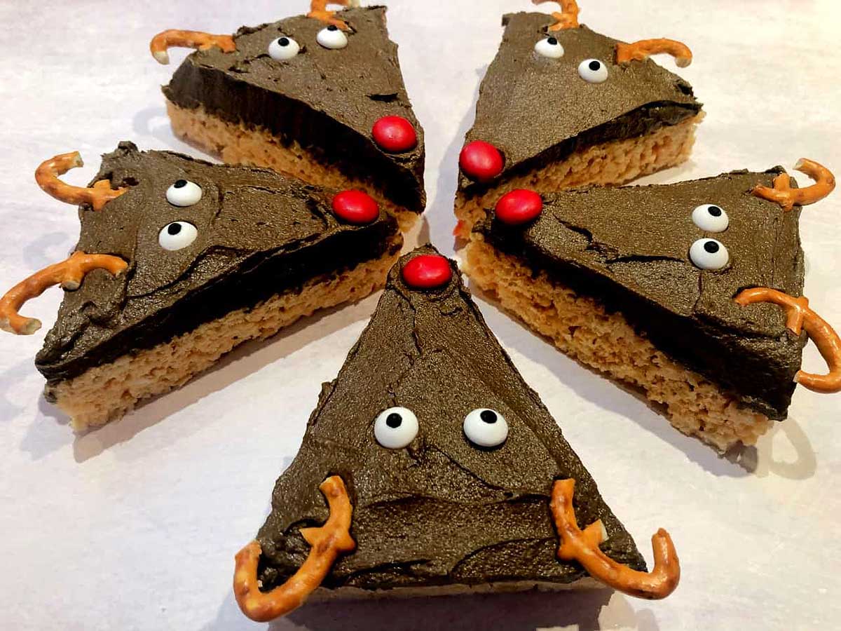 Festive rice krispie treats shaped like Christmas reindeer.