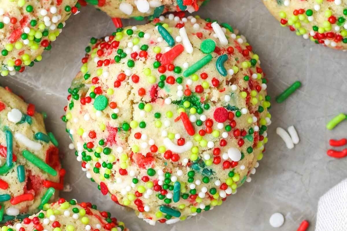 A plate of cookies with sprinkles on it.
