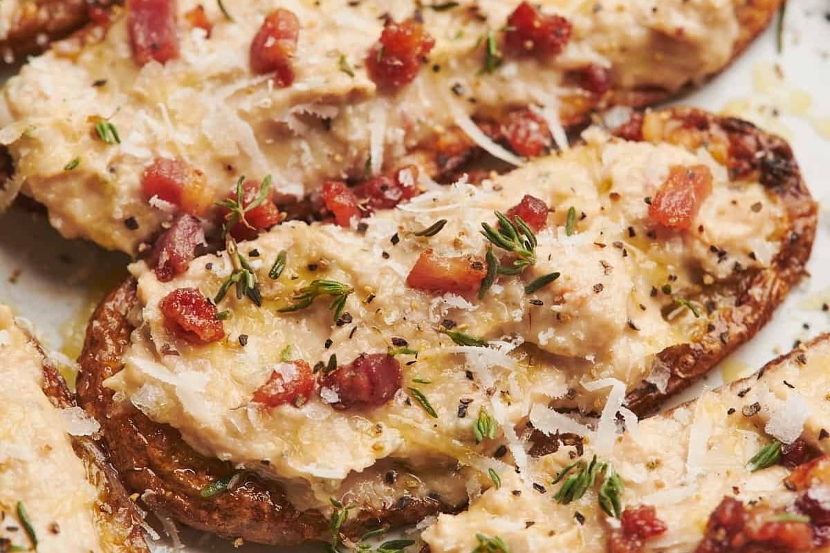 Crostini topped with bacon and thyme, perfect for a feast of seven fishes.