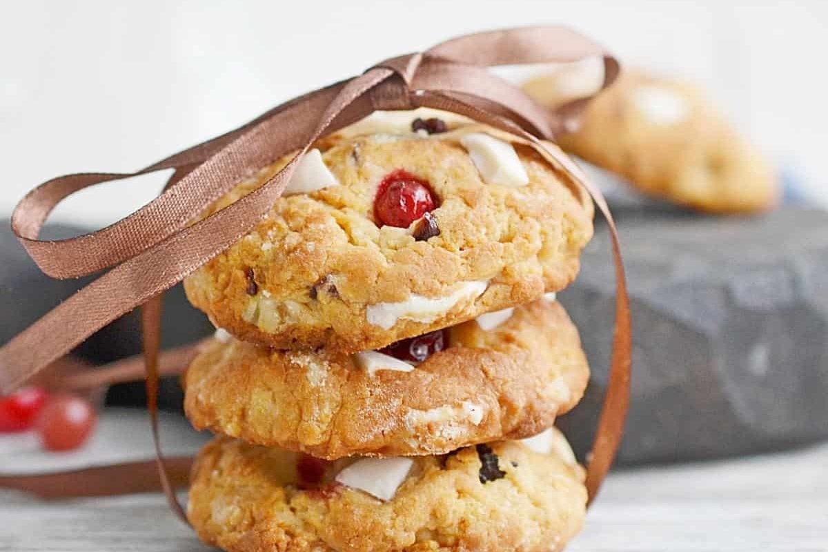 A stack of cranberry cookies with icing.