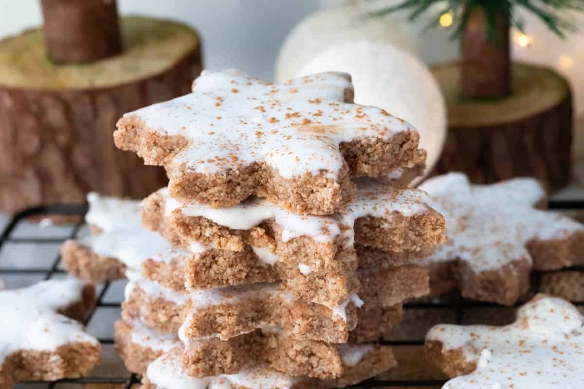 A stack of cinnamon sugar cookies on a cooling rack.