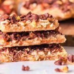 Christmas crack or graham cracker toffee bars stacked on a table.
