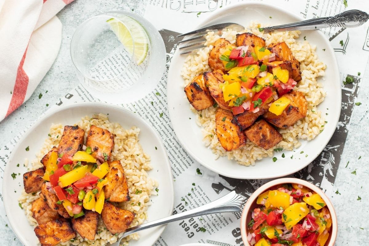Wholesome plate of rice and chicken with mango salsa.