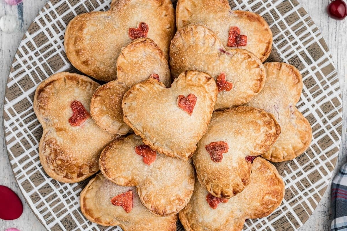 Valentine's day heart-shaped food on a wooden plate.