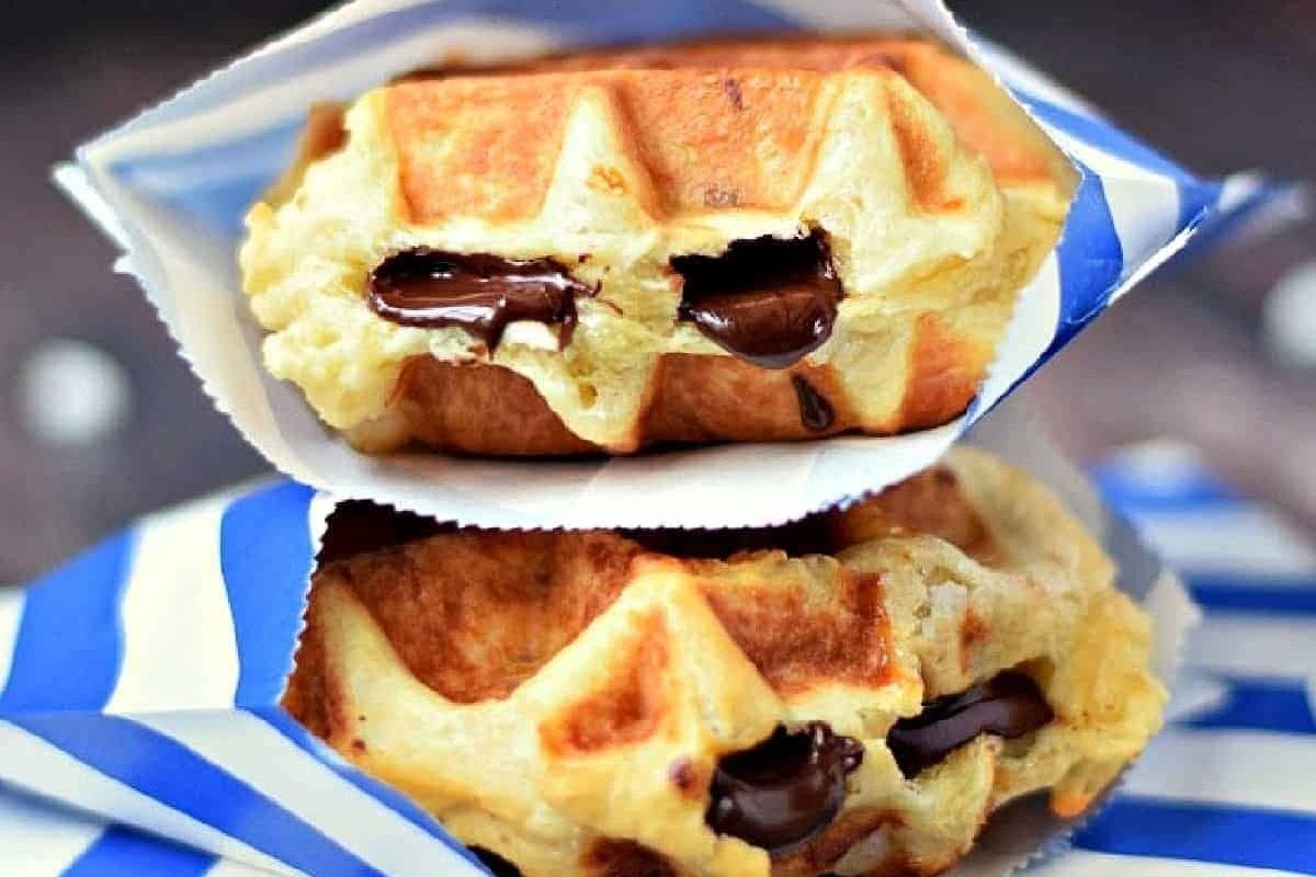 Indulge in delectable chocolate waffles adorned with luscious chocolate chips.