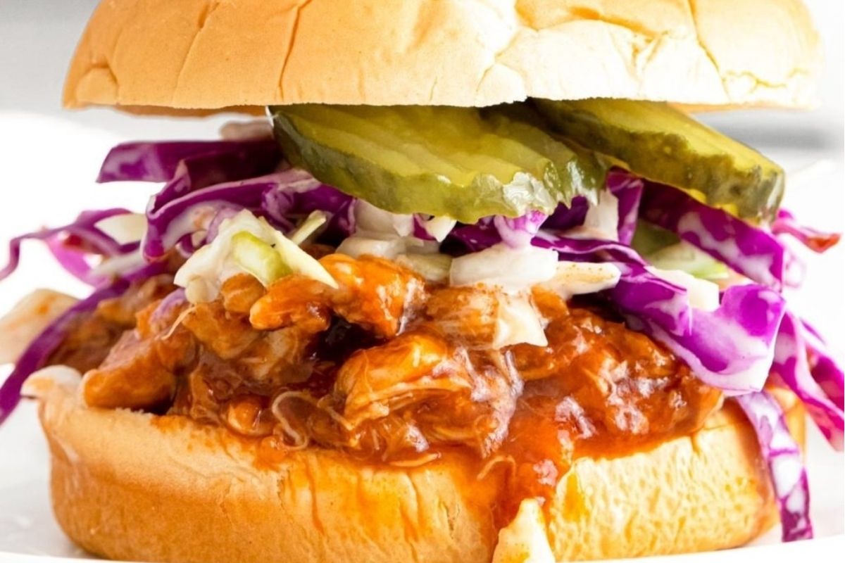 A winter-friendly Instant Pot bbq pulled pork sandwich with coleslaw.