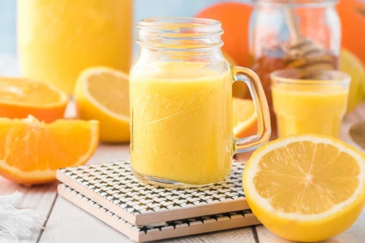 Tangy orange juice infused with slices of oranges and a touch of honey, perfect for citrus lovers looking for refreshing recipes.