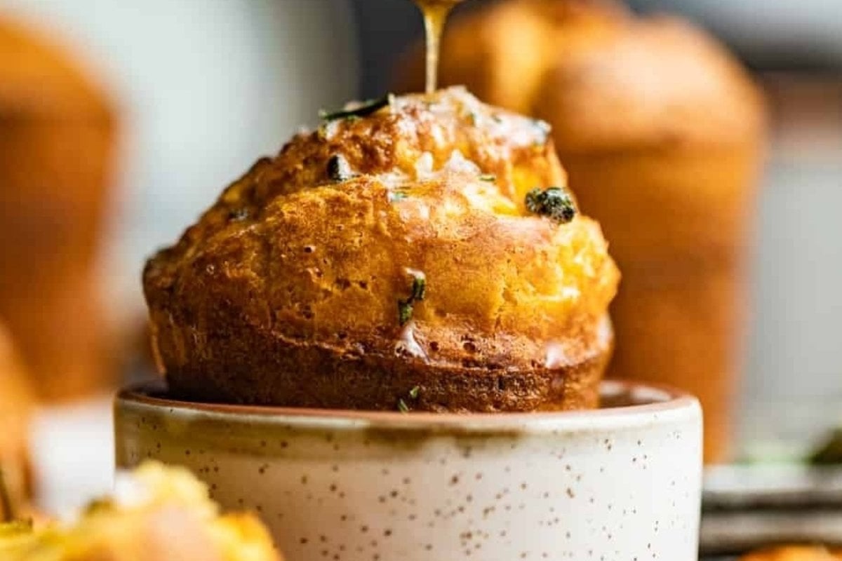 Savory muffins in a ceramic bowl.