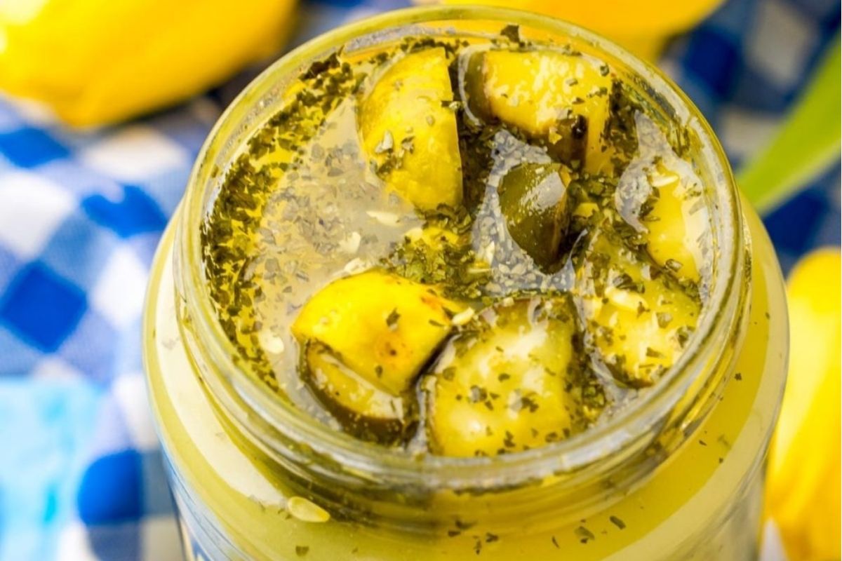 A jar filled with homemade pickle recipes.