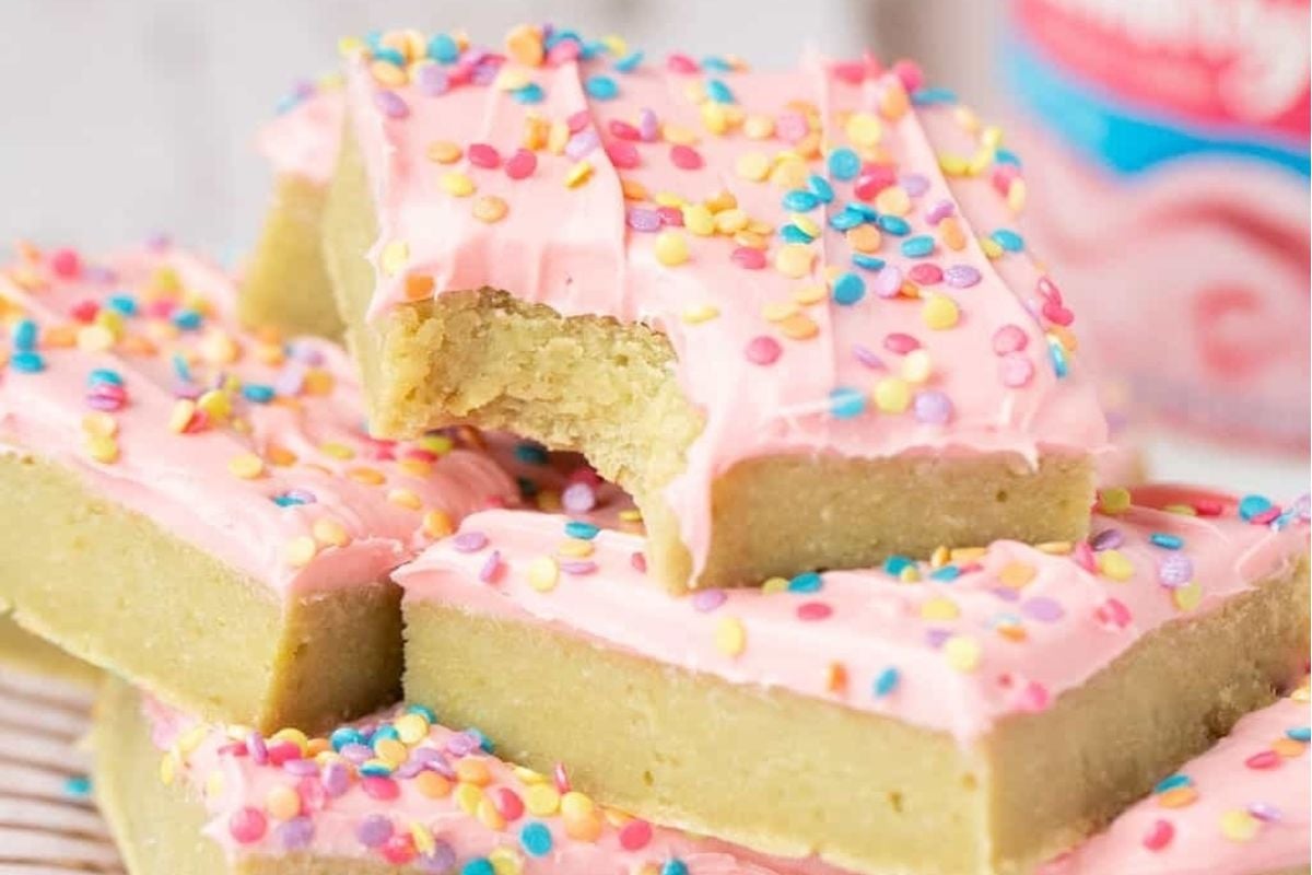 A stack of Valentine's desserts on a plate.