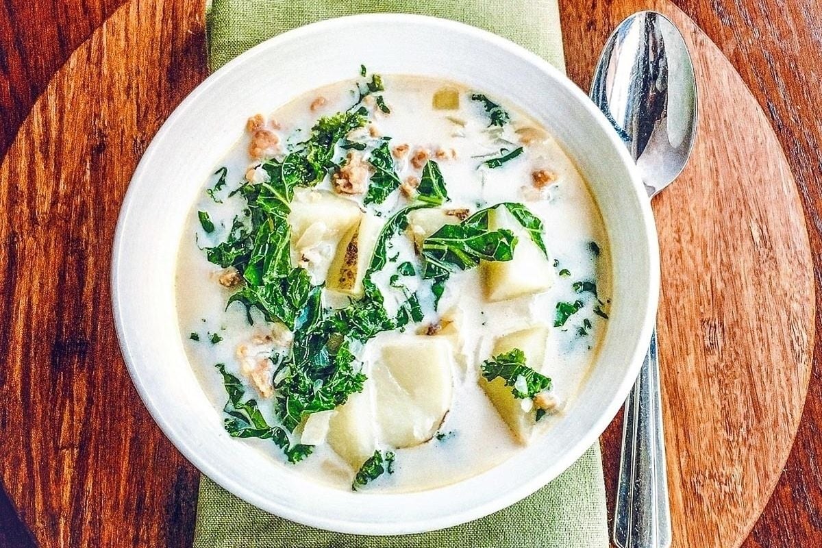 Creamy kale soup with walnuts.