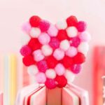 Valentine's Day is the perfect time to engage in a cute and creative craft like making heart-shaped pom pom bookmarks. This fun and easy pom pom craft is sure to bring joy to your loved ones