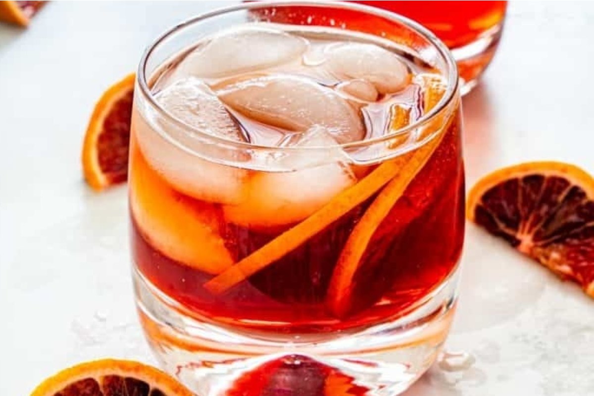 A St Patrick's drink with blood orange slices and ice.