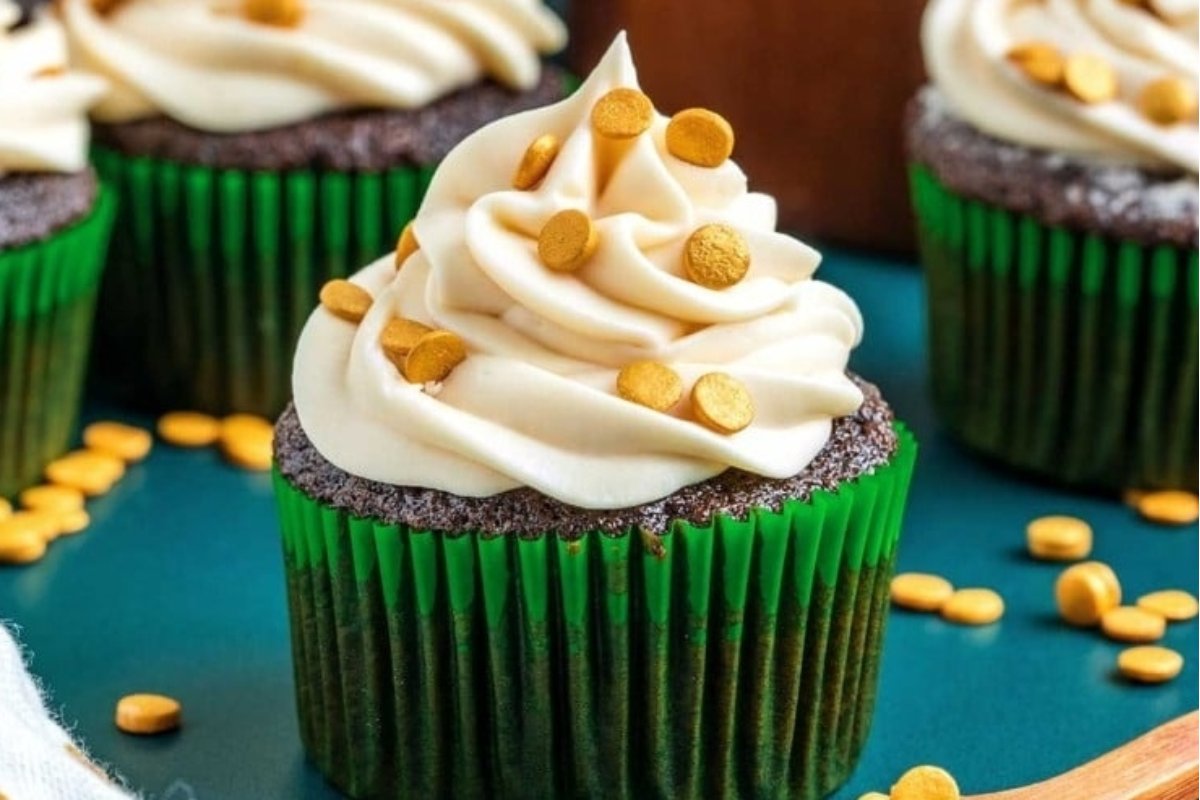 St Patrick's day cupcakes with green frosting and gold sprinkles are perfect St Patrick's treats.