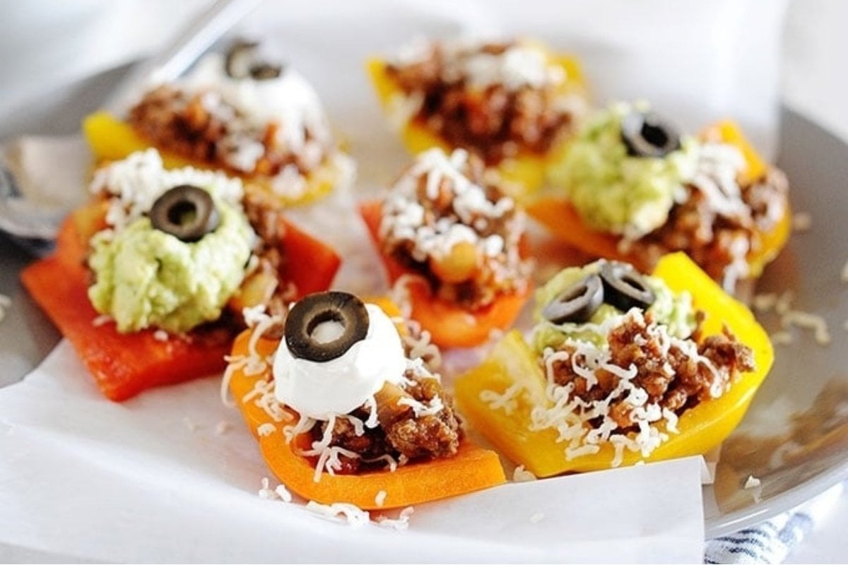 Mexican stuffed peppers on a girl's dinner plate.