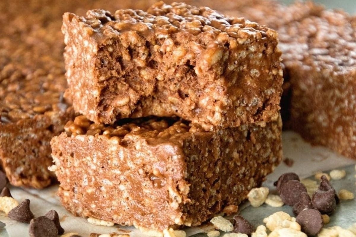 A stack of chocolate peanut butter granola bars stacked on top of each other.