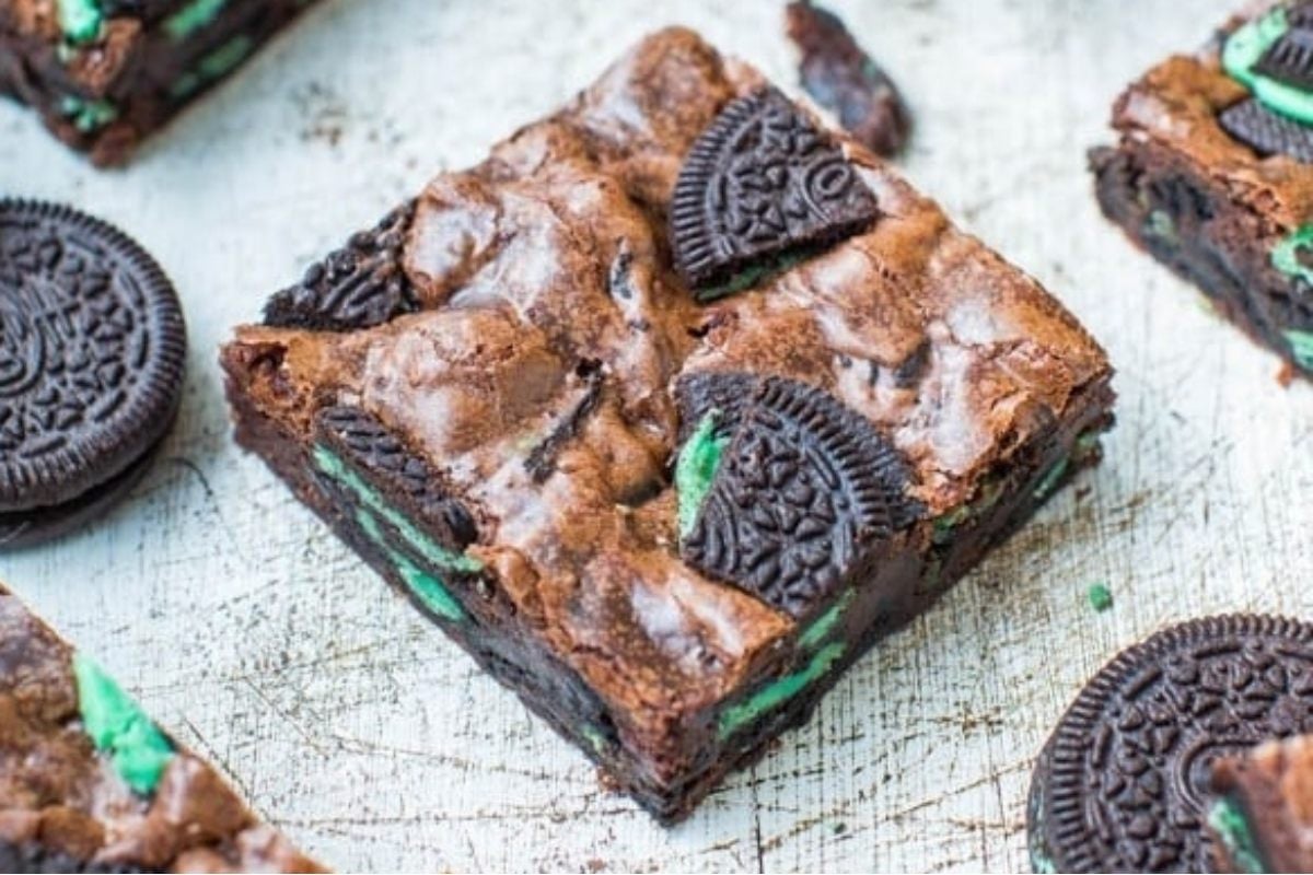 Chocolate mint Oreo brownies with green sprinkles on top.