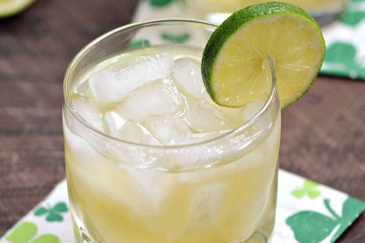 A St Patrick's drink with ice and a lime wedge.