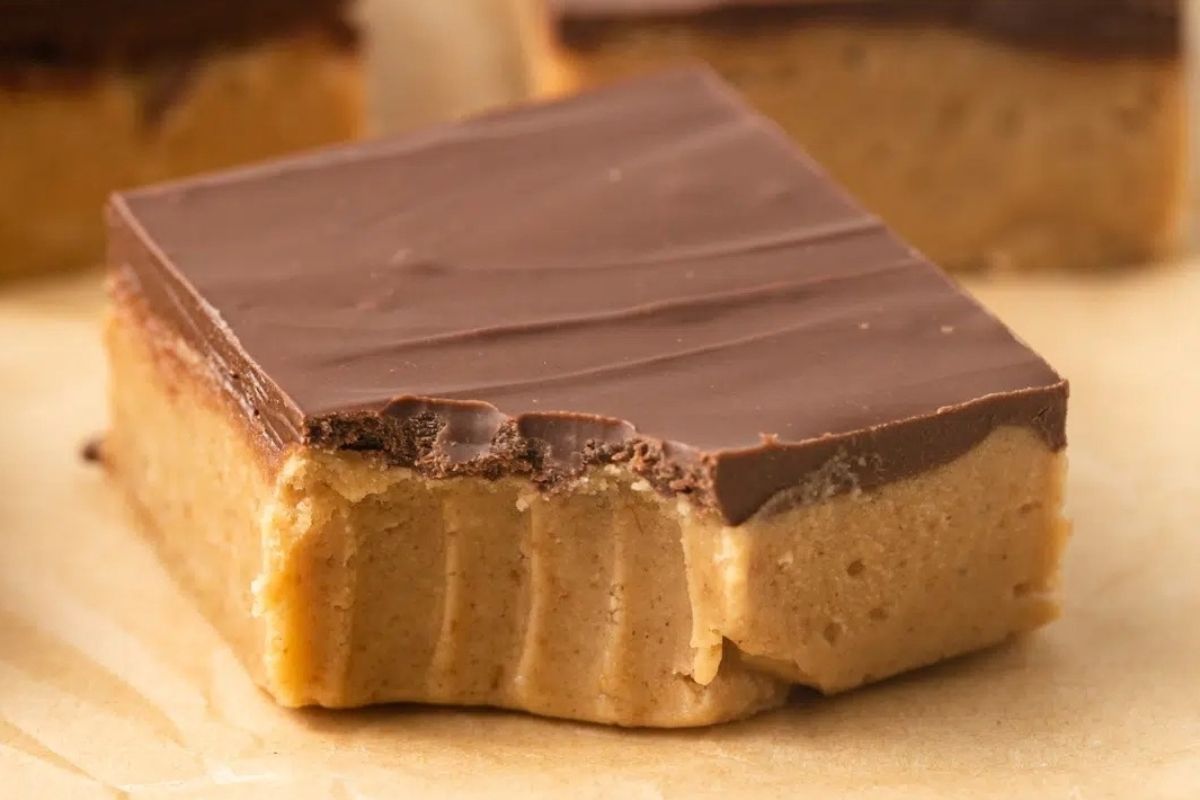 Chocolate peanut butter fudge on a piece of paper.