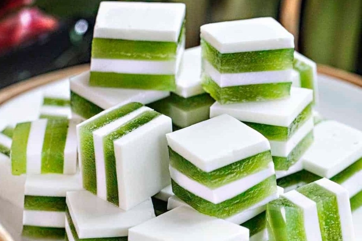 A plate of green and white ice cubes, perfect as St. Patrick's treats, sits on a plate.