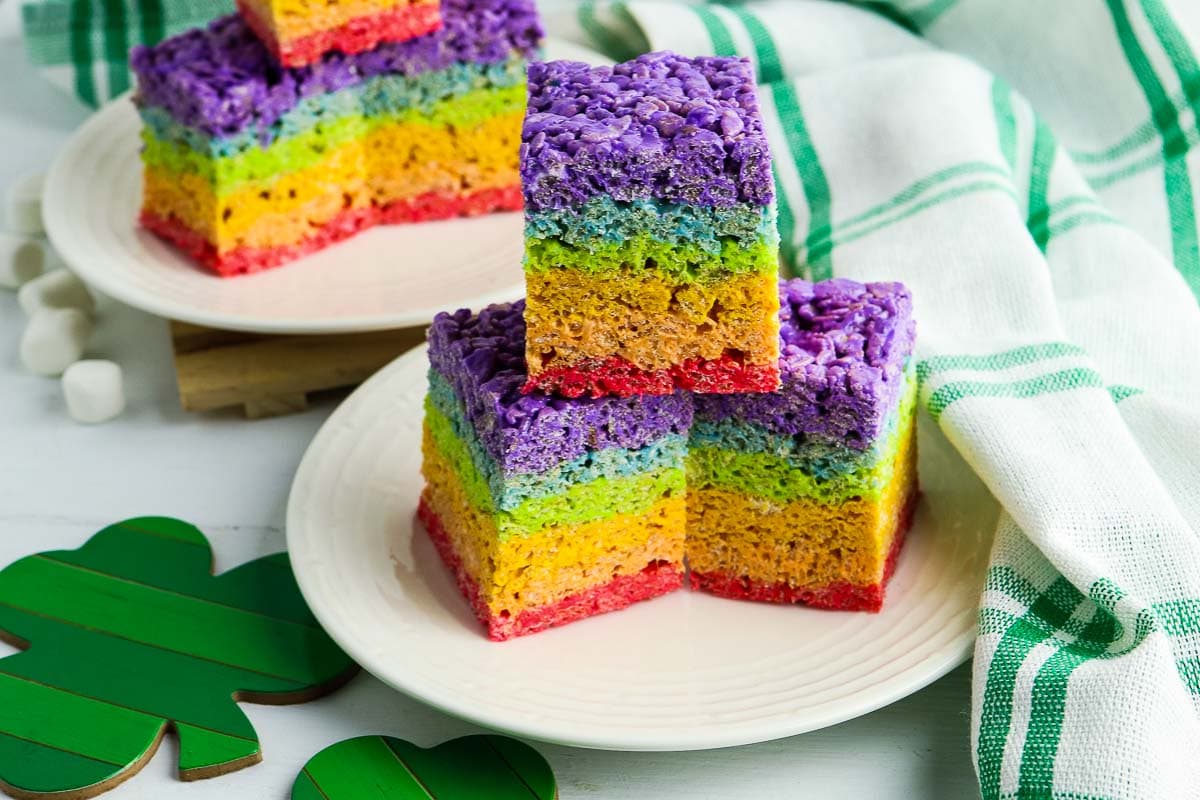 A rainbow rice cake on a plate, perfect for rainbow recipes.