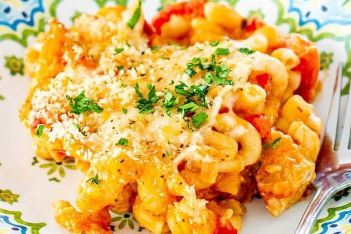 A plate with spring macaroni and cheese casserole on it.