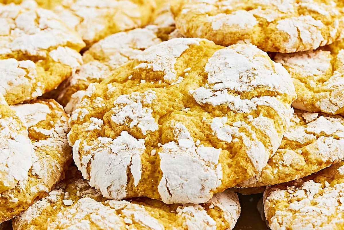 Close-up of freshly baked Easter crinkle cookies with powdered sugar topping.