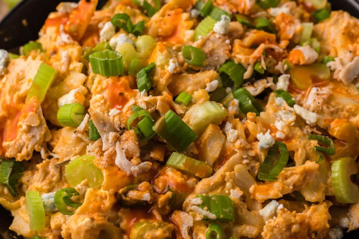 A skillet filled with chicken and vegetables for dinner recipes.                                                                                          